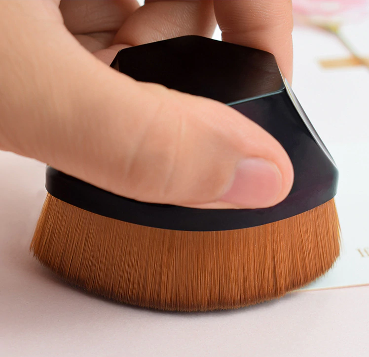 This hexagonal three-dimensional foundation Makeup Brush will give you a soft silky feel on the skin. Made of non-harmful synthetic fiber and has densely packed bristles to provide a high-definition finish. Can be used with liquid, powder, or cream foundation without absorption. Made with synthetic fiber, so it is safe for sensitive skin. The 3D square handle is ergonomically designed and allows for a comfortable and easy grip. It comes with a storage box, making it easy for travel