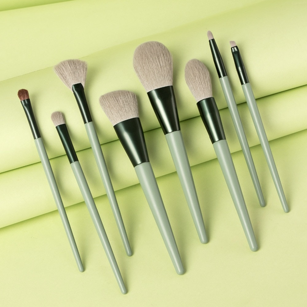  Description  Each set comes with 8 brushes:  Highlight Brush Lip Brush Eyebrow Brush Small Eye Shadow Brush Large Eye Shadow Brush Blush Brush Powder Brush Contour Brush Specifications:  Brush Handle Material: Wood/Aluminum tube  Brush Hair Material: Synthetic Hair