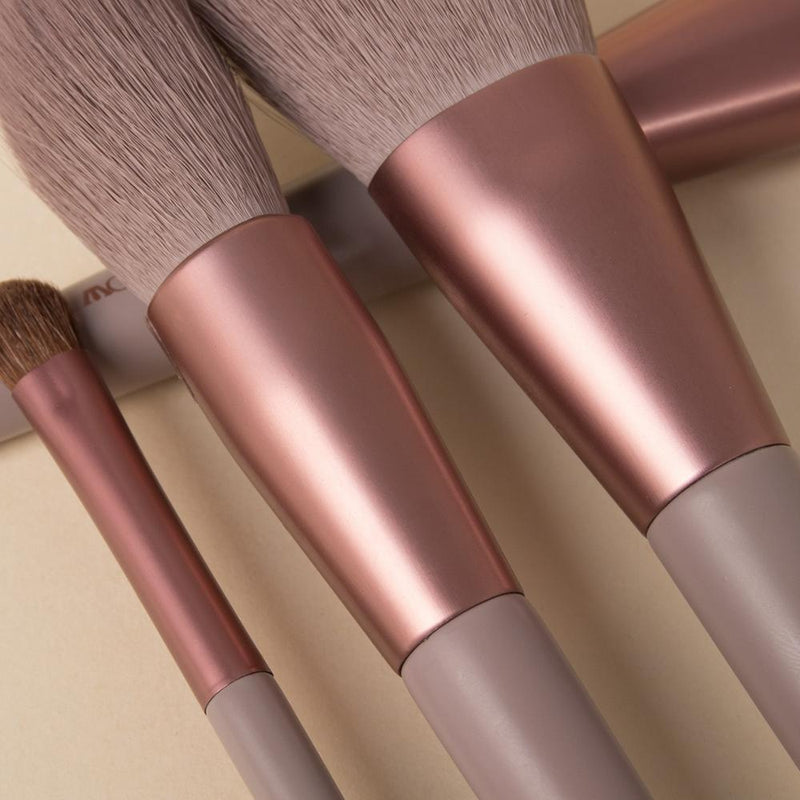  Description  Each set comes with 8 brushes:  Highlight Brush Lip Brush Eyebrow Brush Small Eye Shadow Brush Large Eye Shadow Brush Blush Brush Powder Brush Contour Brush Specifications:  Brush Handle Material: Wood/Aluminum tube  Brush Hair Material: Synthetic Hair