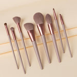  Description  Each set comes with 8 brushes:  Highlight Brush Lip Brush Eyebrow Brush Small Eye Shadow Brush Large Eye Shadow Brush Blush Brush Powder Brush Contour Brush Specifications:  Brush Handle Material: Wood/Aluminum tube  Brush Hair Material: Synthetic Hair