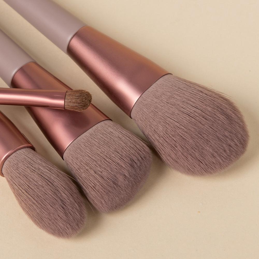  Description  Each set comes with 8 brushes:  Highlight Brush Lip Brush Eyebrow Brush Small Eye Shadow Brush Large Eye Shadow Brush Blush Brush Powder Brush Contour Brush Specifications:  Brush Handle Material: Wood/Aluminum tube  Brush Hair Material: Synthetic Hair