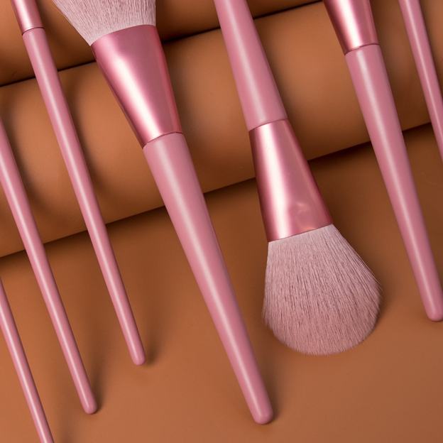  Description  Each set comes with 8 brushes:  Highlight Brush Lip Brush Eyebrow Brush Small Eye Shadow Brush Large Eye Shadow Brush Blush Brush Powder Brush Contour Brush Specifications:  Brush Handle Material: Wood/Aluminum tube  Brush Hair Material: Synthetic Hair