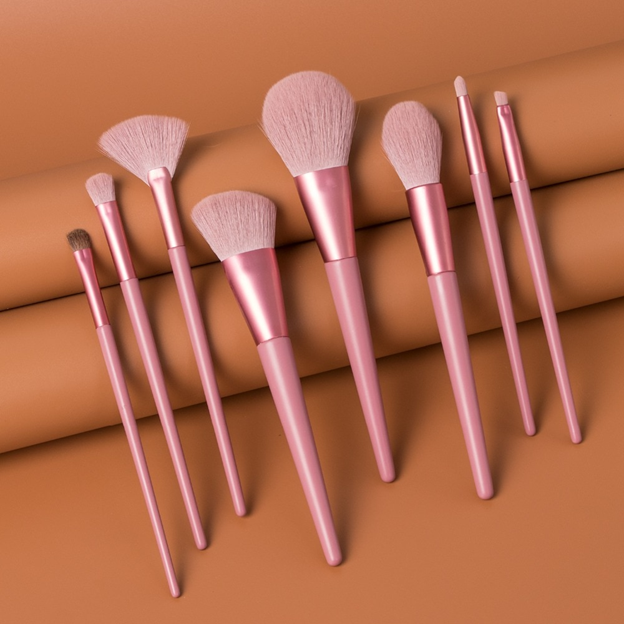  Description  Each set comes with 8 brushes:  Highlight Brush Lip Brush Eyebrow Brush Small Eye Shadow Brush Large Eye Shadow Brush Blush Brush Powder Brush Contour Brush Specifications:  Brush Handle Material: Wood/Aluminum tube  Brush Hair Material: Synthetic Hair